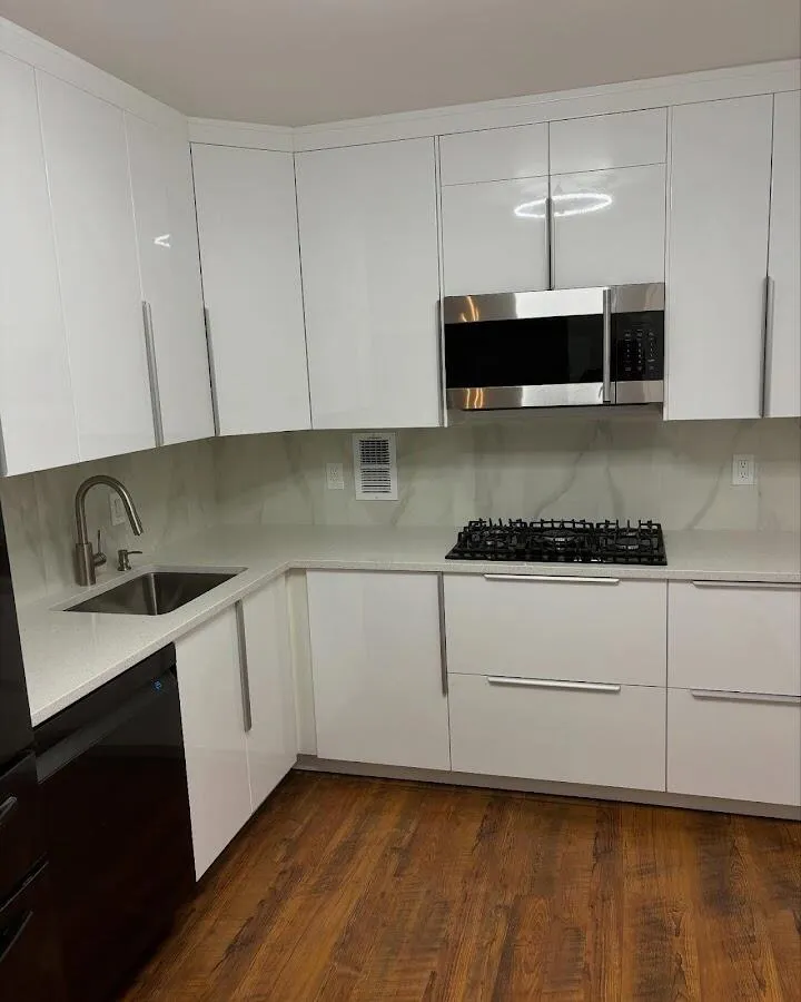 Restored kitchen with white cabinets after water damage in Muskogee